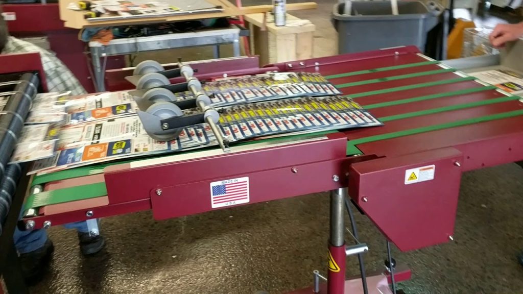 Flexcut 760 – Die Cutting, stripping 30pt laminate mailers with CR-80 cards perfed